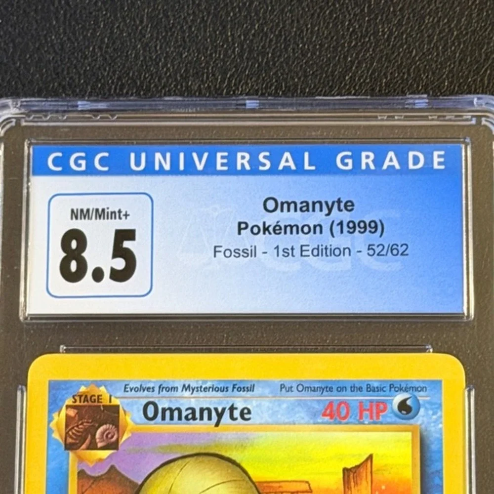 Pokemon Omanyte 1st Edition Fossil 52/62 CGC 8.5 NM/Mint+ TCG 1999 WOTC Vintage
